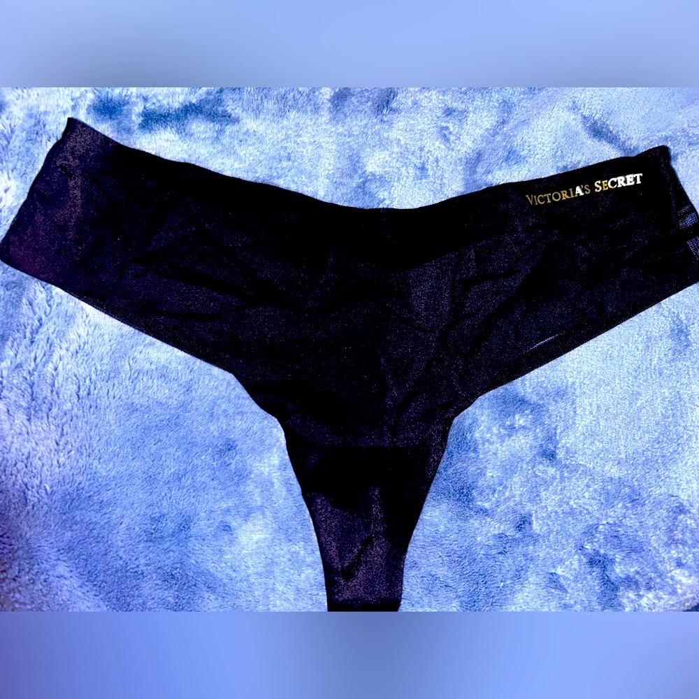 Victoria’s Secret thong with lace see thru back. Very sexy